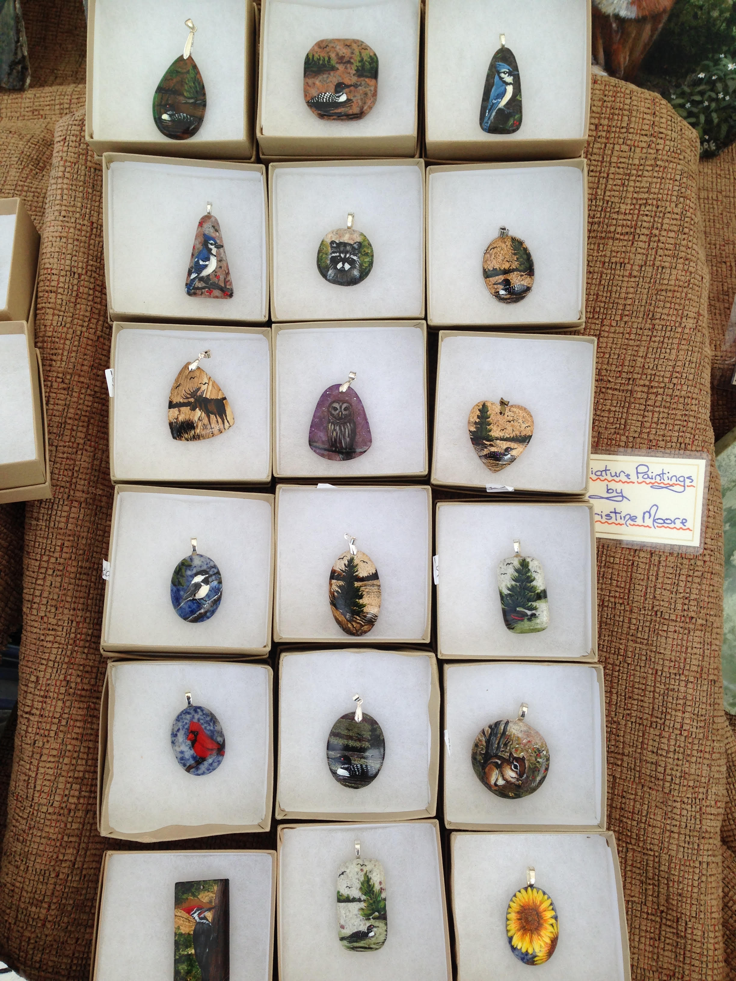 Miniature paintings on granite pendants